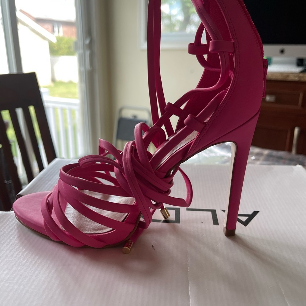 Beautiful pink heels, almost new, lace up.